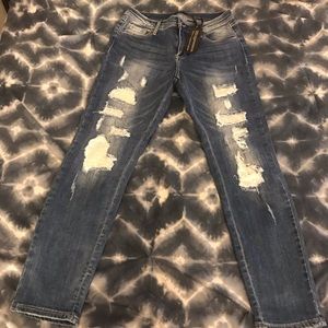 Bebe Jeans 👖 Ripped with sequence underlining